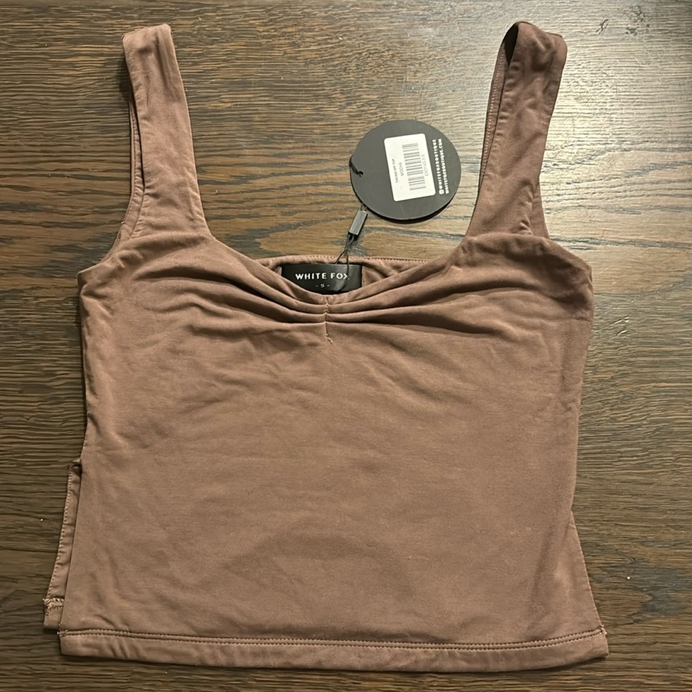 Brand new never warn mocha taking off white fox top with slits and ruching